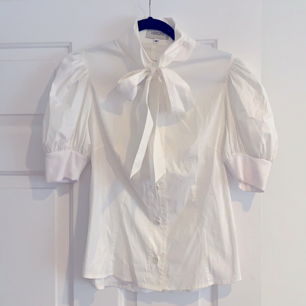Super cute bottom tie front blouse.